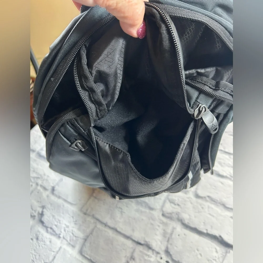 Adidas Black and White Laptop Backpack.